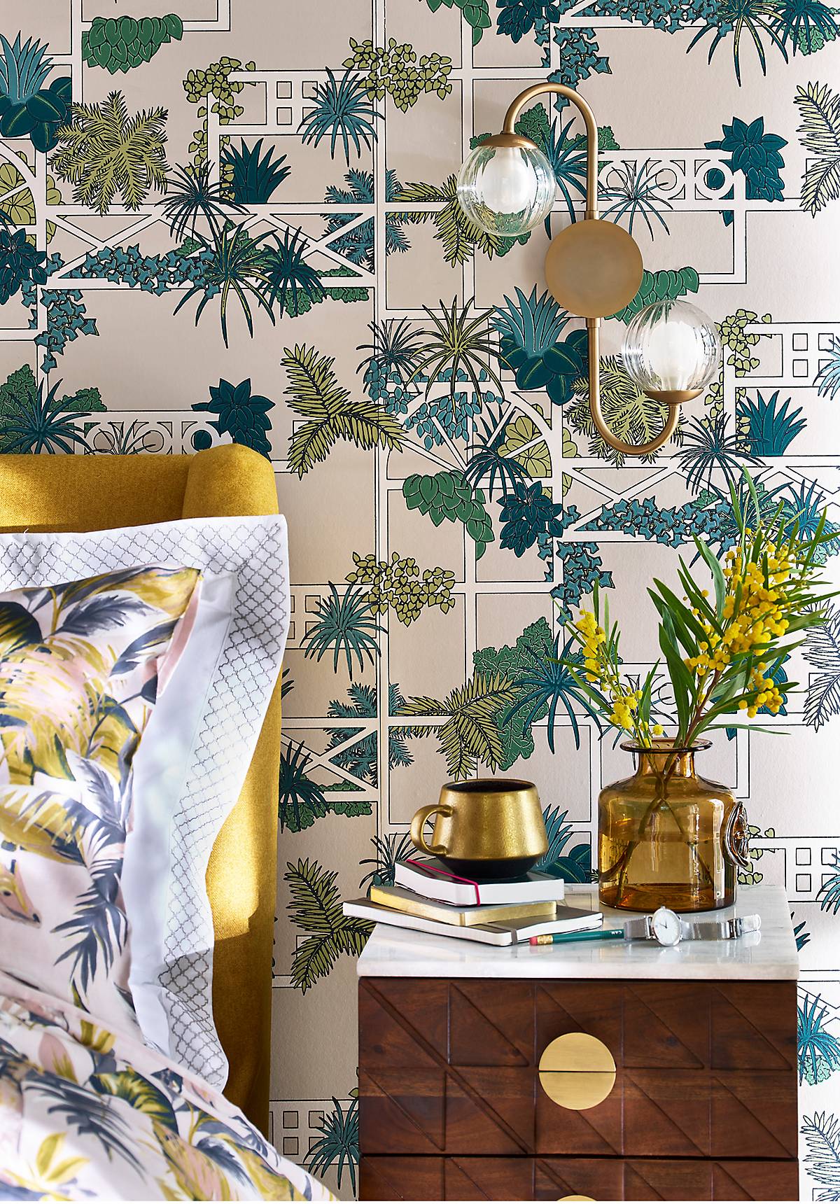 Vintage Palm inspired wallpaper creates a feature being an upholstered bed.